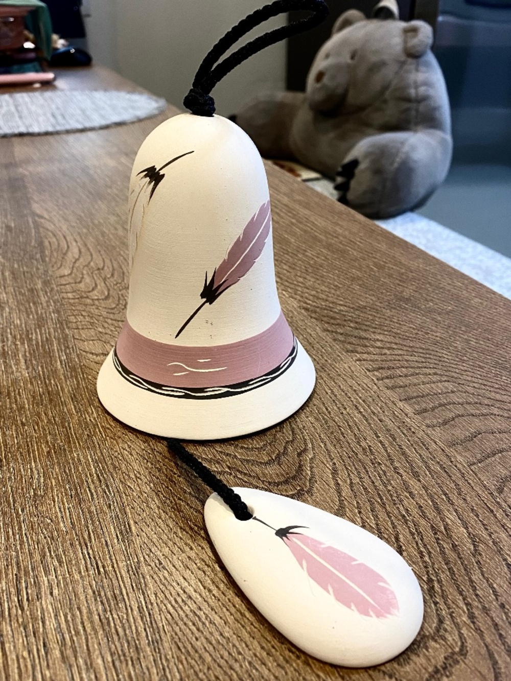 Native American Style Hand-Painted Ceramic Bell with Feather Design